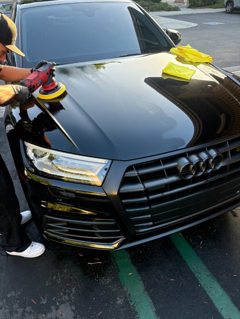 Machine paint correction in progress during a mobile one step correction in Orange County