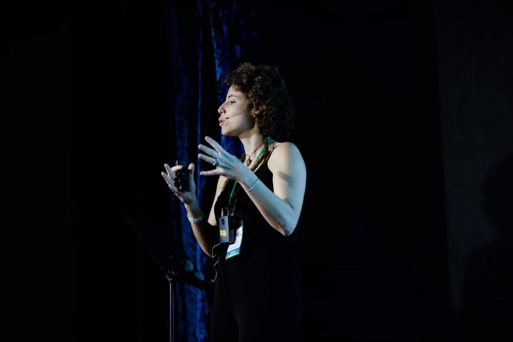 Diana speaking on stage