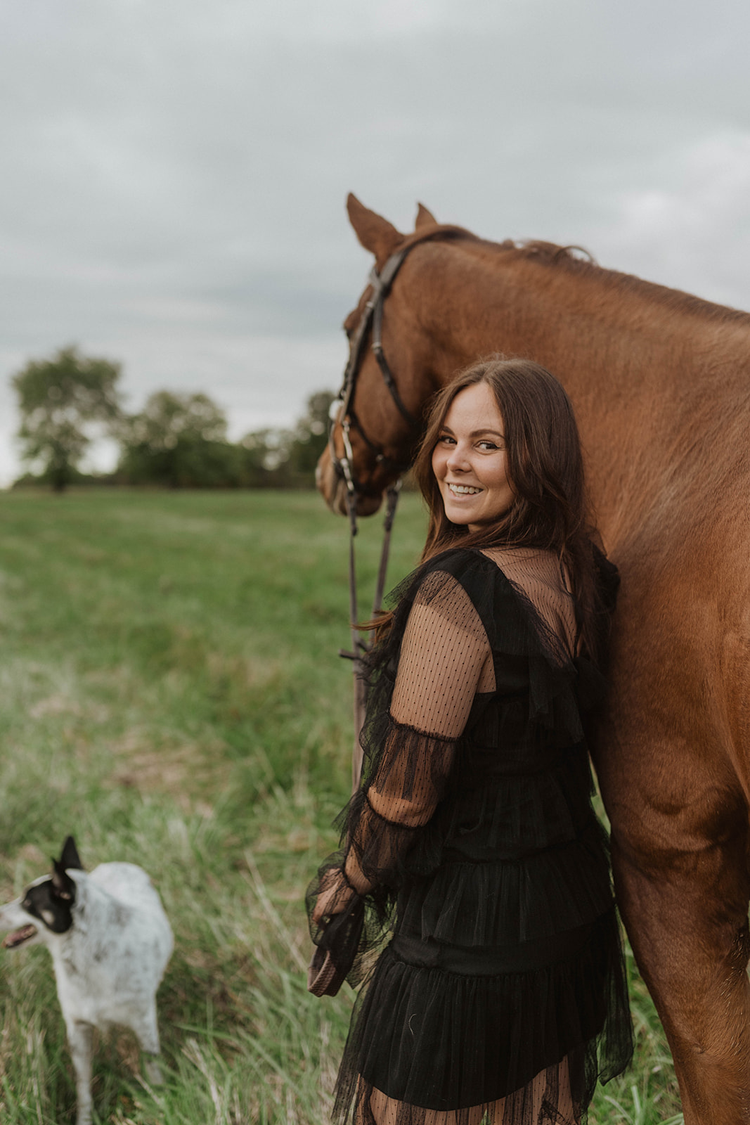 Alyssa Mathis, founder of BarnPilot, with her horse