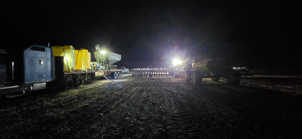 Night planting operation with equipment lights