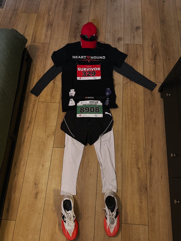 Race day kit laid out — Survivor bib #329 ready to go