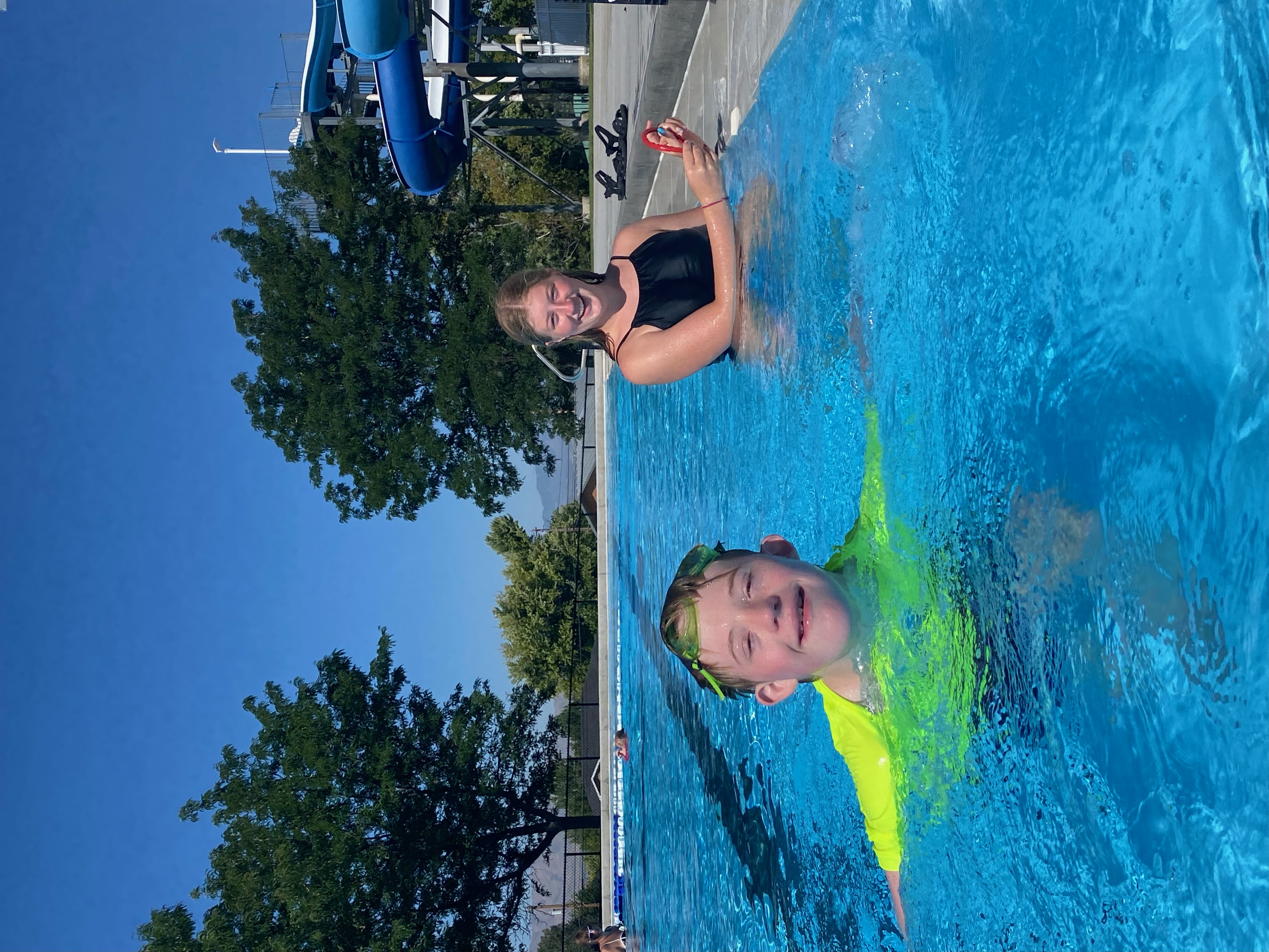 Instructor and student practicing in the pool