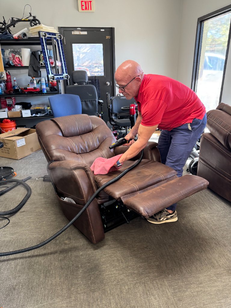 Technician servicing a lift chair at T-Town Mobility in Tulsa Oklahoma