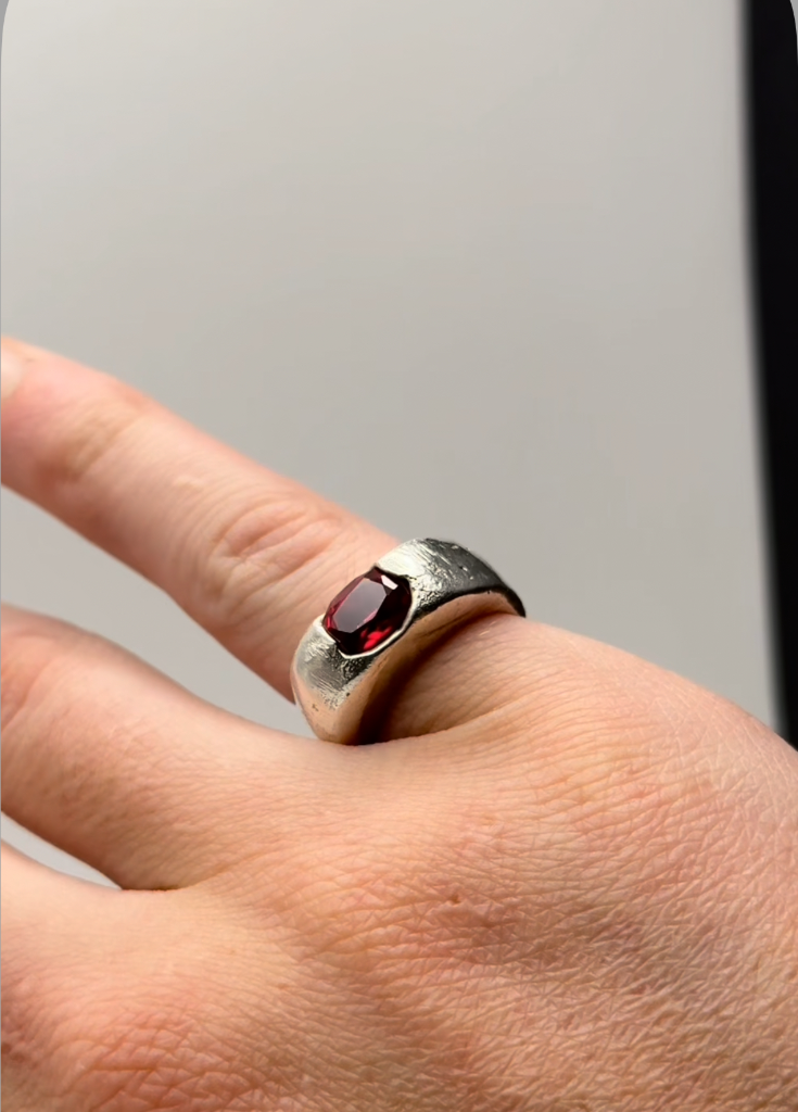 Sterling silver ring with garnet stone