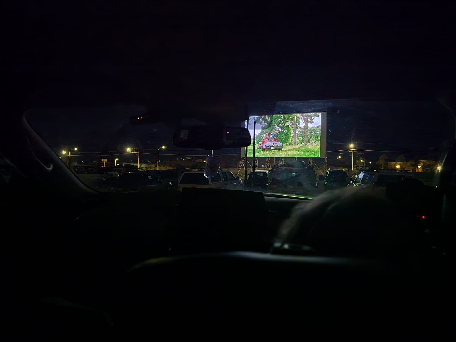 Watching the big screen from the comfort of the car