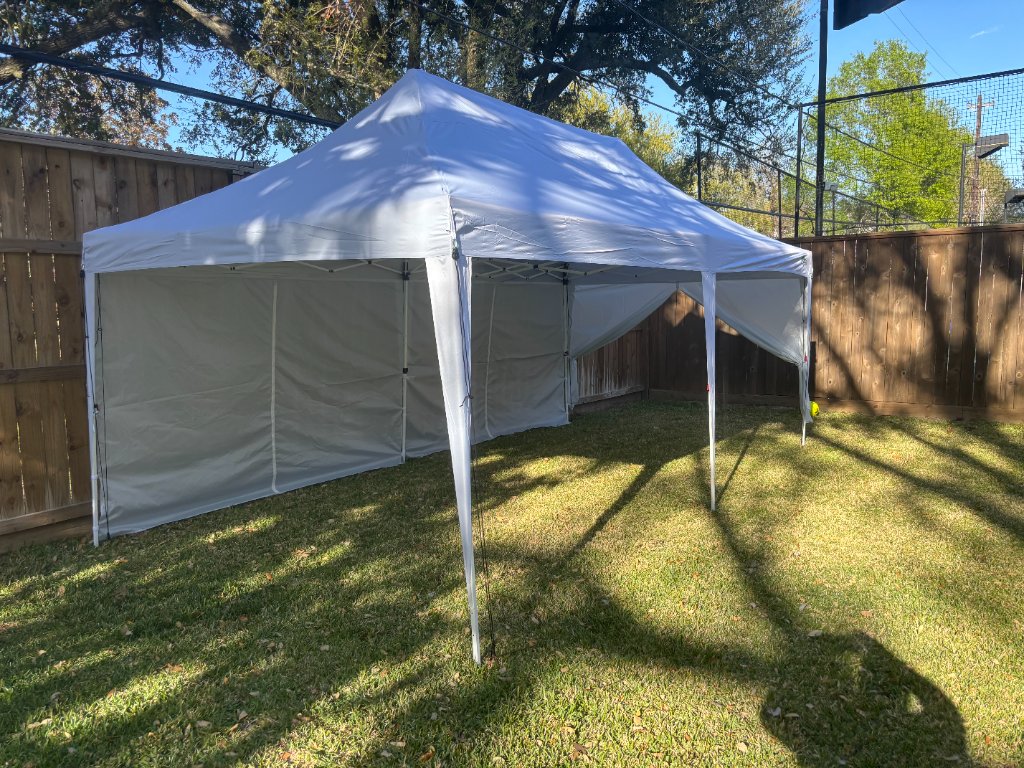 White canopy with side walls — sleek backyard setup 🌿