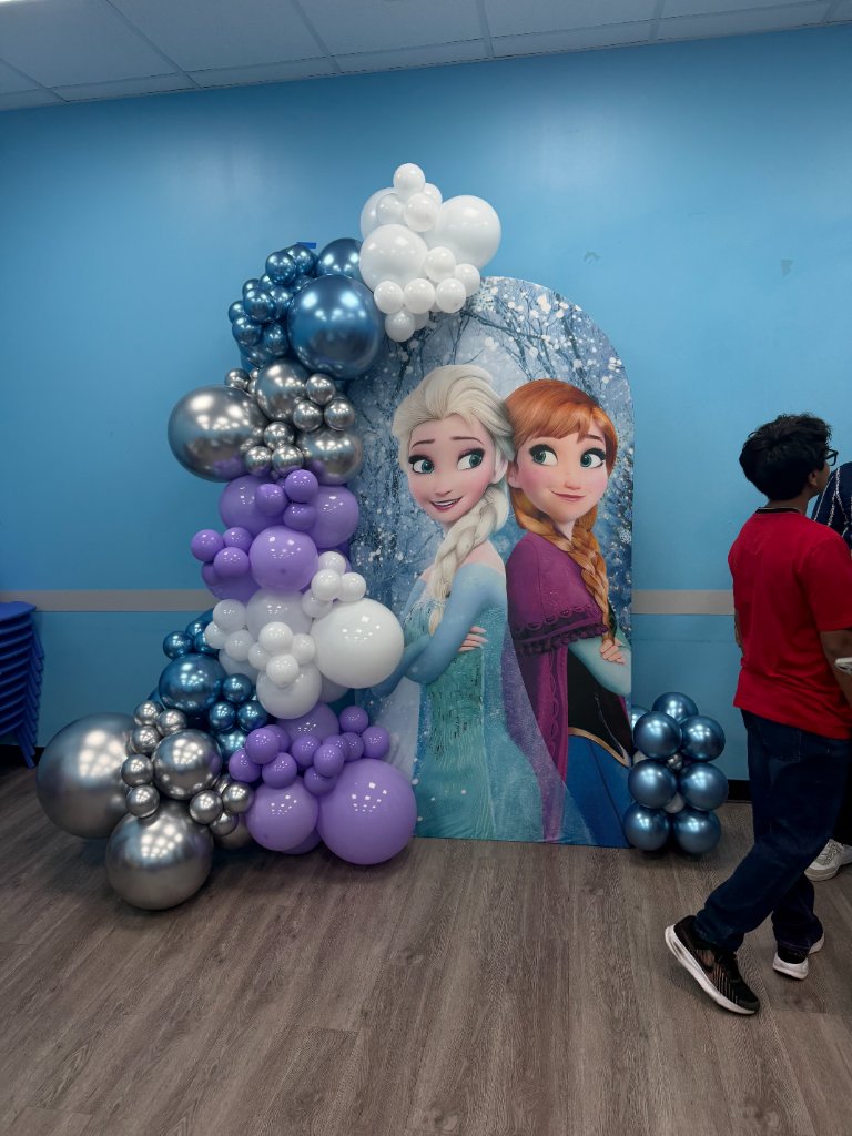 Frozen backdrop — icy blue & silver with Elsa cutout ❄️