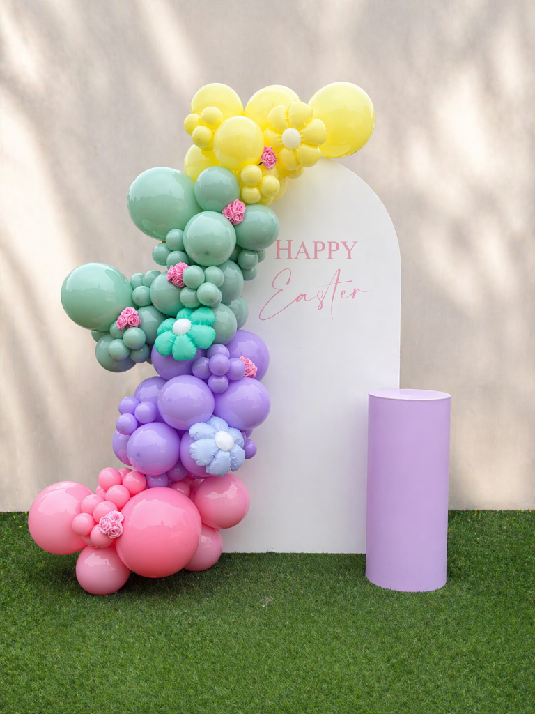 Pastel Easter garland — floral arch with lavender pedestal 🌸