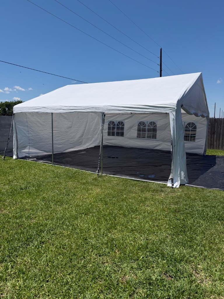 White canopy tent — pristine side view on lush green ☀️