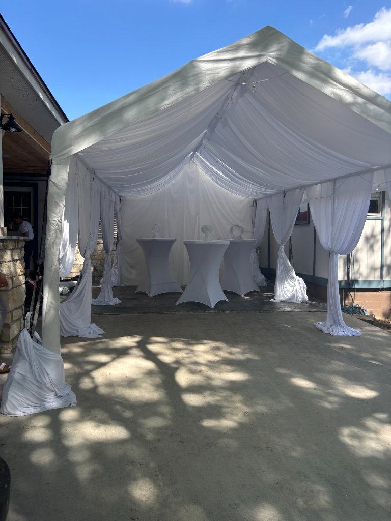 Tent arched windows glowing with warm string lights 🌟