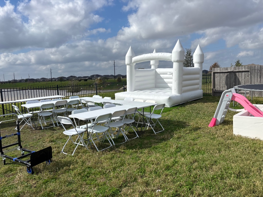 White canopy with crystal-clear sidewalls on green lawn 🏕️