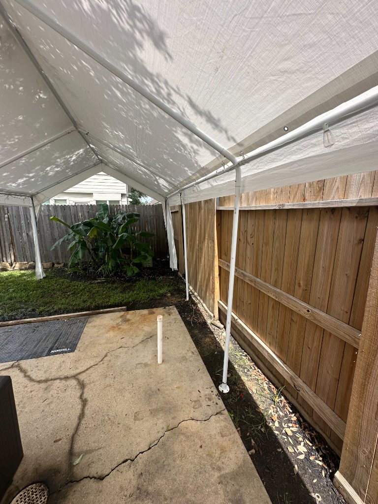 White tent covering backyard pool — spacious & stunning 🌿