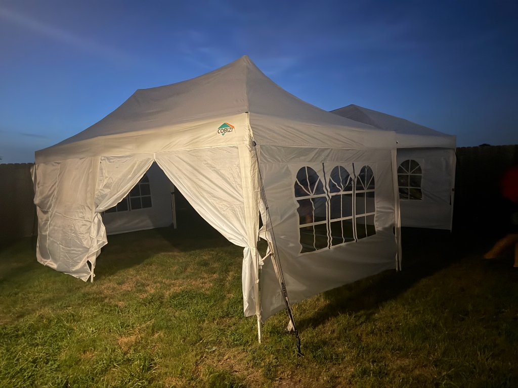 White canopy glowing at twilight — enchanting evening glow 🌙