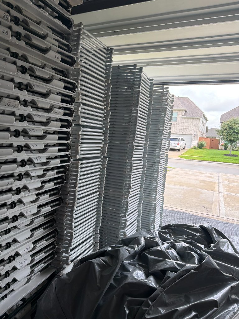 White resin chairs stacked — flawless delivery prep 🪑