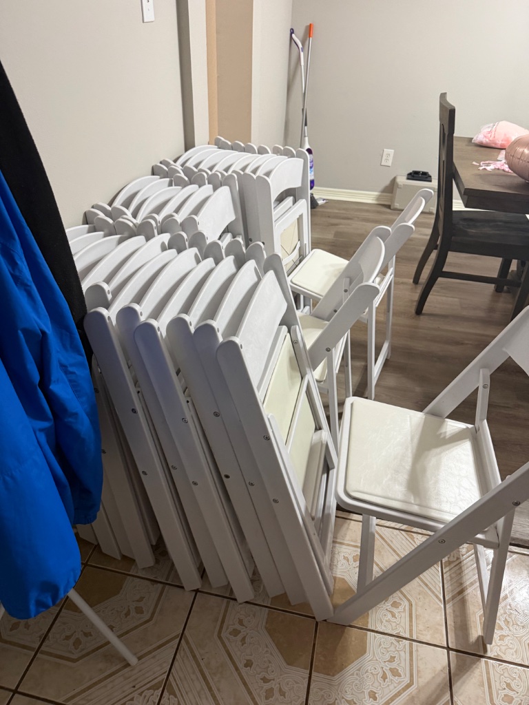 Pristine white chairs — indoors & delivery-ready 🪑