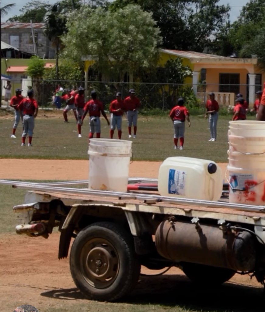 Baseball practice on the dirt field