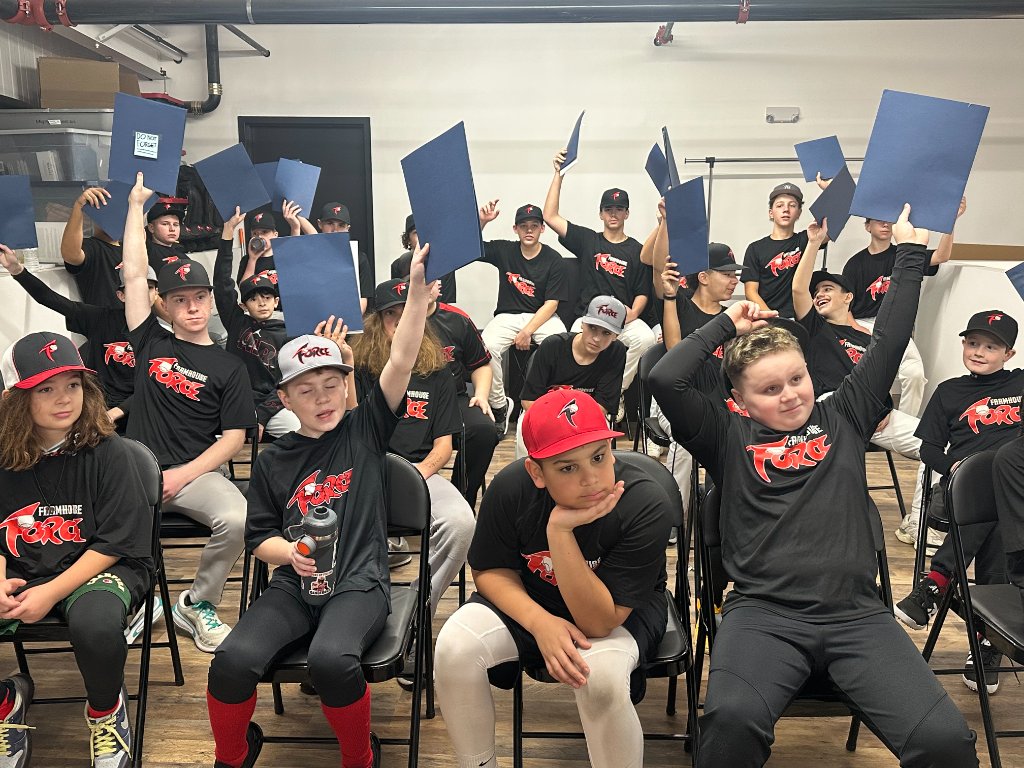 Athletes holding folders