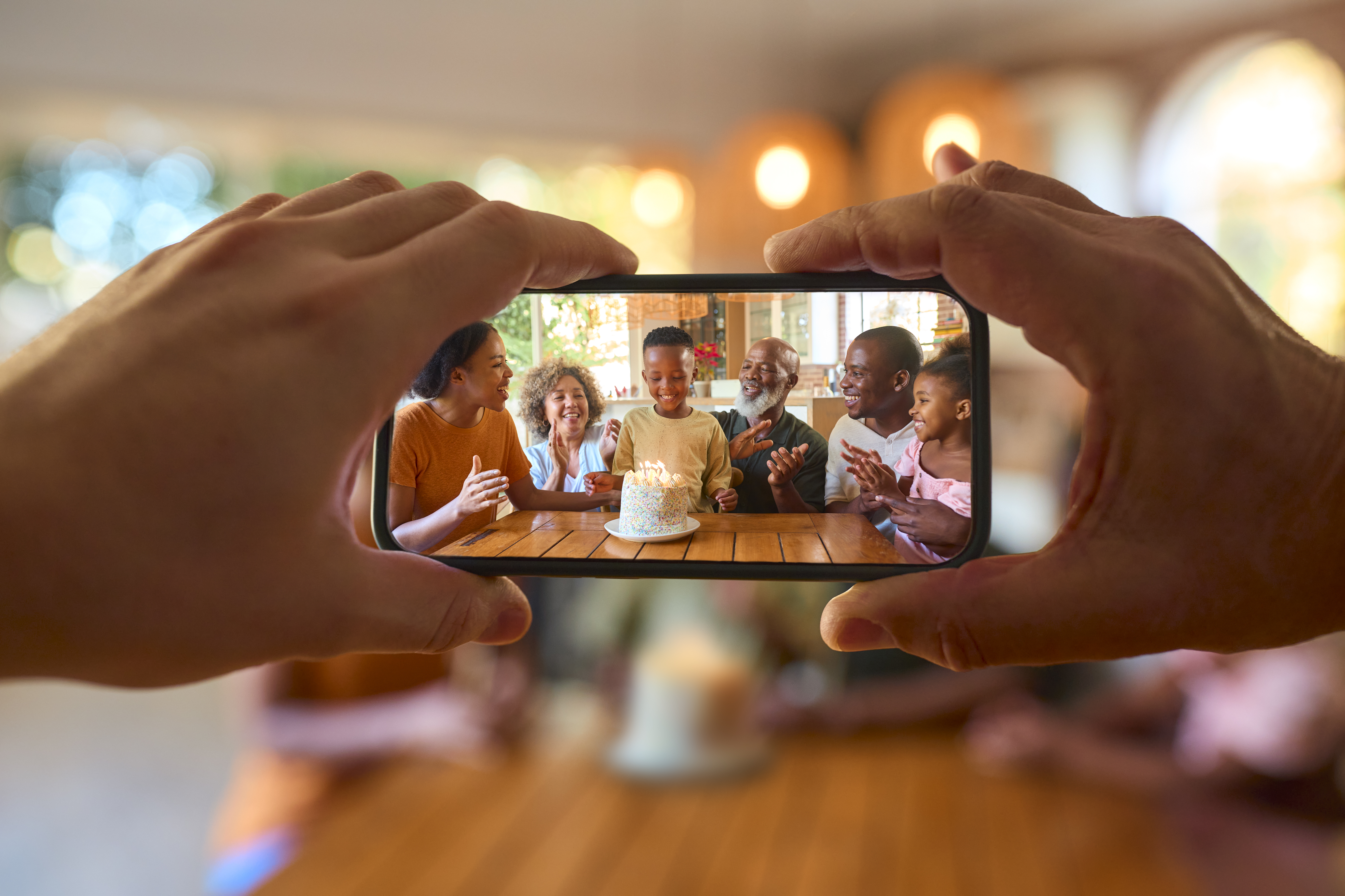 Guests at an event using a free photo scavenger hunt app on their phones, scanning QR codes and taking photos