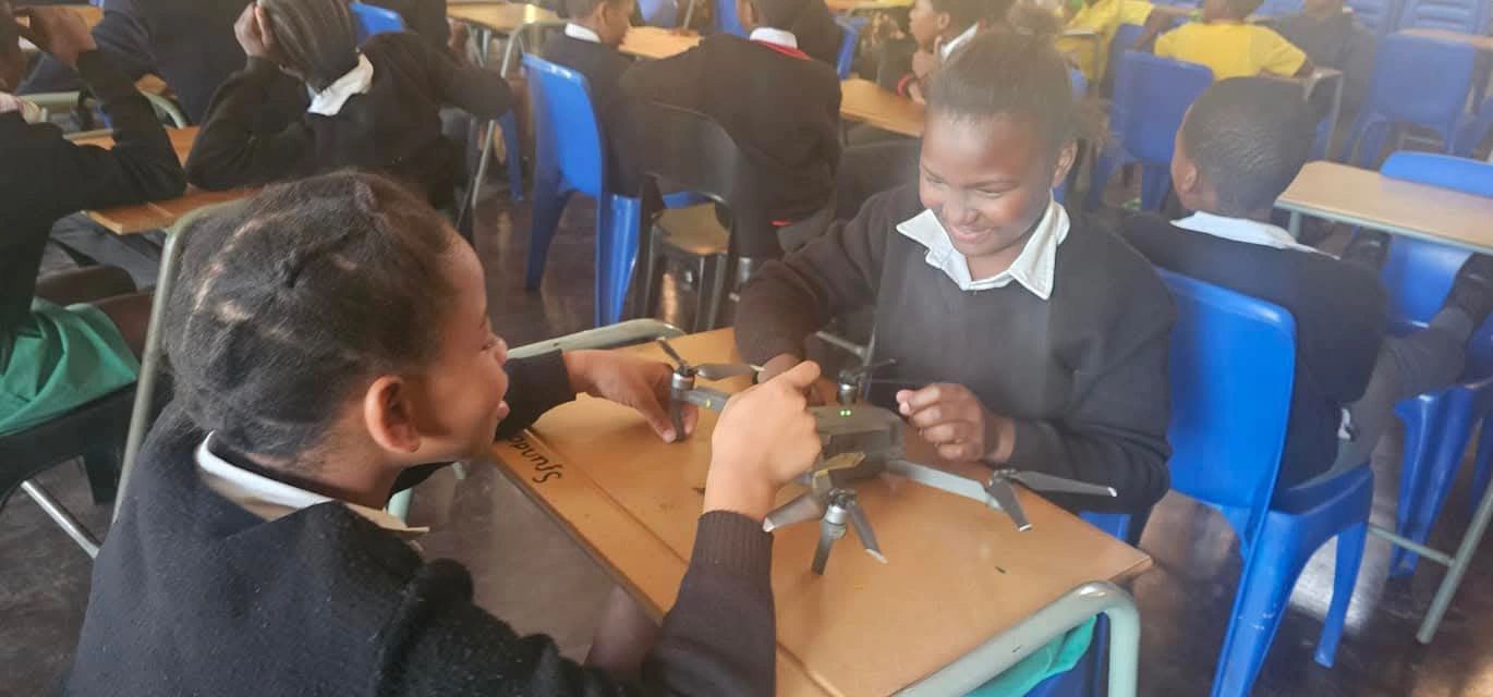 Awali Academy community programme with participants at computer lab