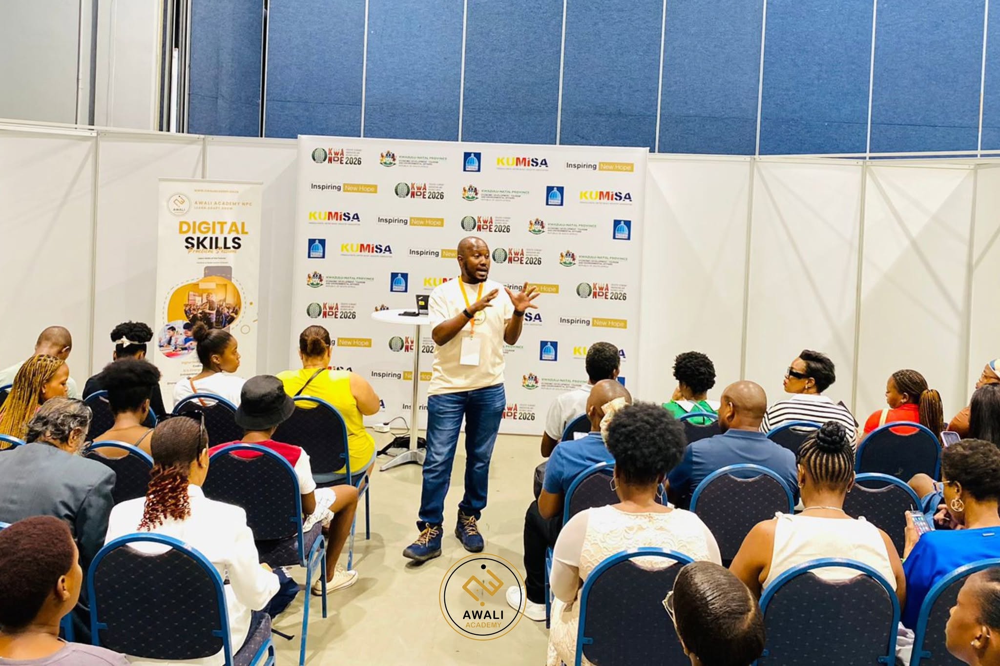 Awali Academy founder addressing a community digital skills workshop