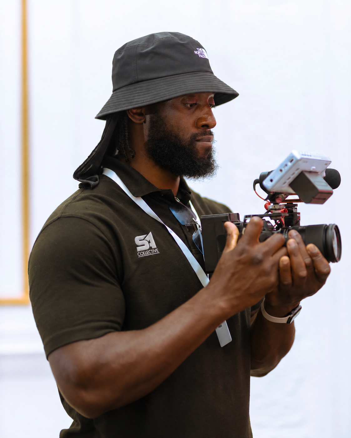 Michael Kiese operating a cinema camera on set