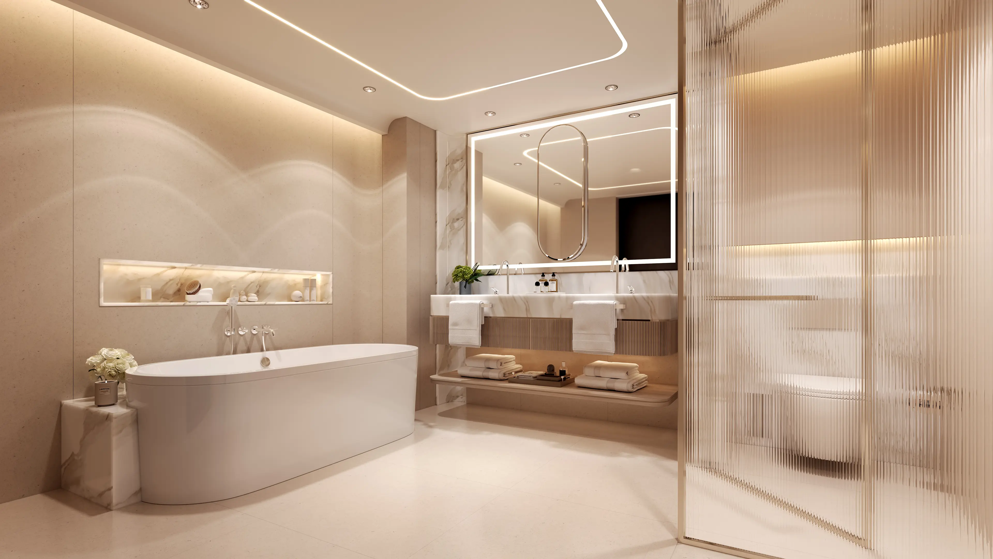 Salle de bain de luxe d'appartement 2 chambres Oystra by Richmind avec baignoire îlot, double vasque en marbre et douche à l'italienne.