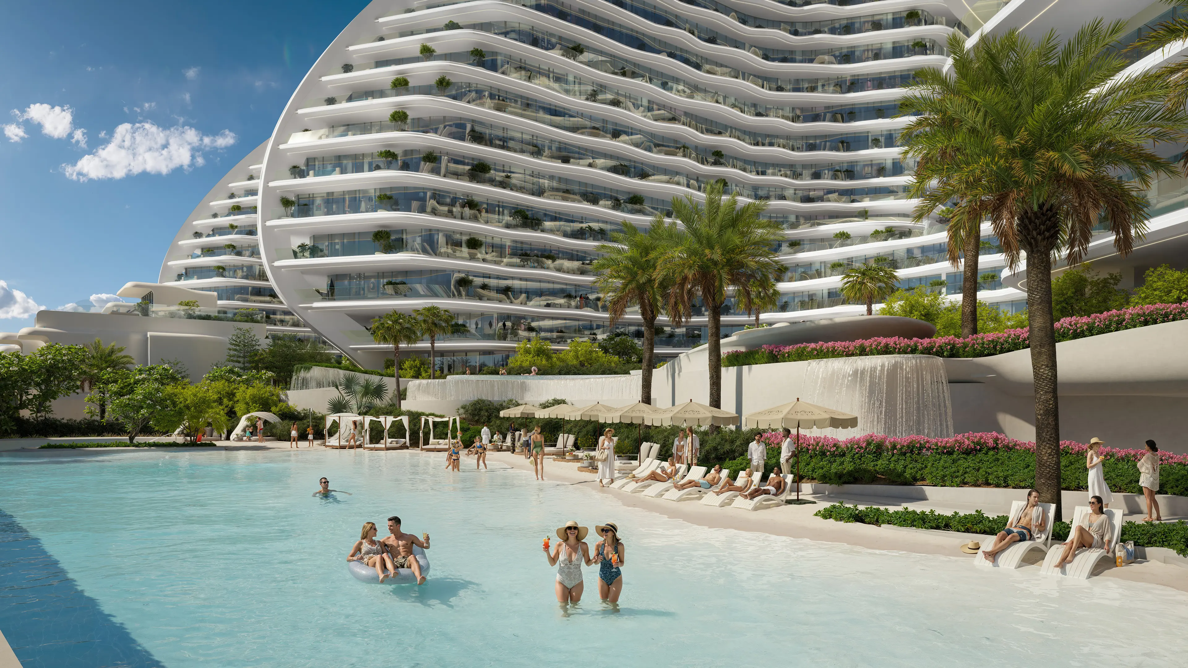 Vue d'ensemble de la piscine de luxe et de l'architecture resort moderne à Oystra by Richmind, avec cascade et paysage tropical.