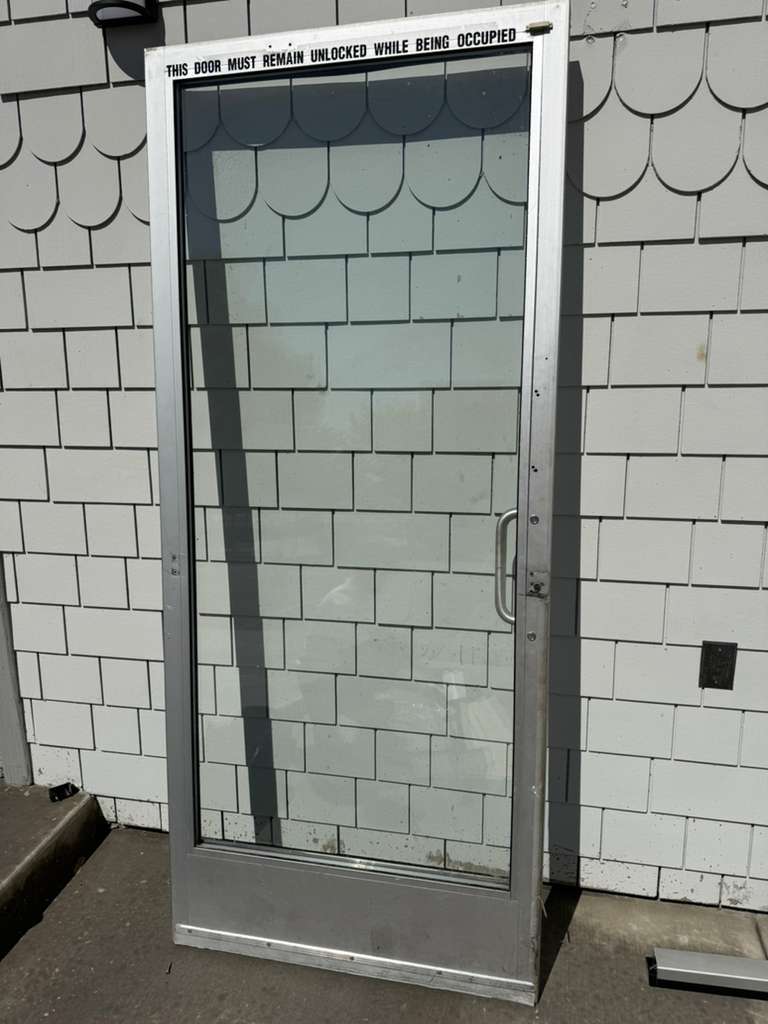 Commercial storefront glass door with aluminum frame