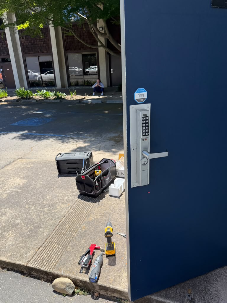 Electronic keypad lock installation on a commercial door