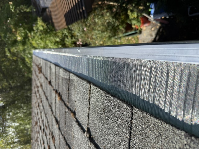 Installed metal mesh gutter guard