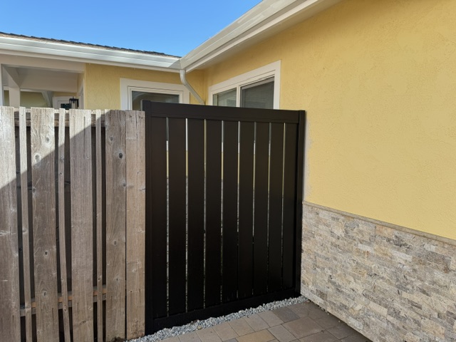Finished non-combustible fence installation