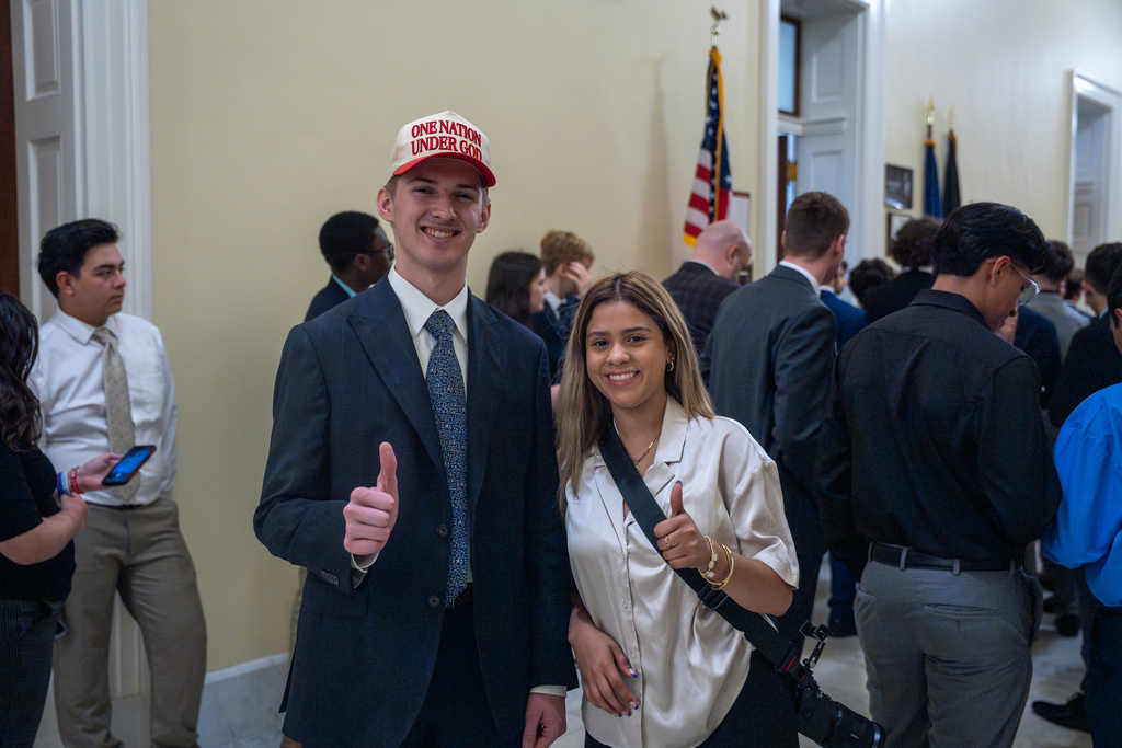 Two NHSC student leaders giving a thumbs up