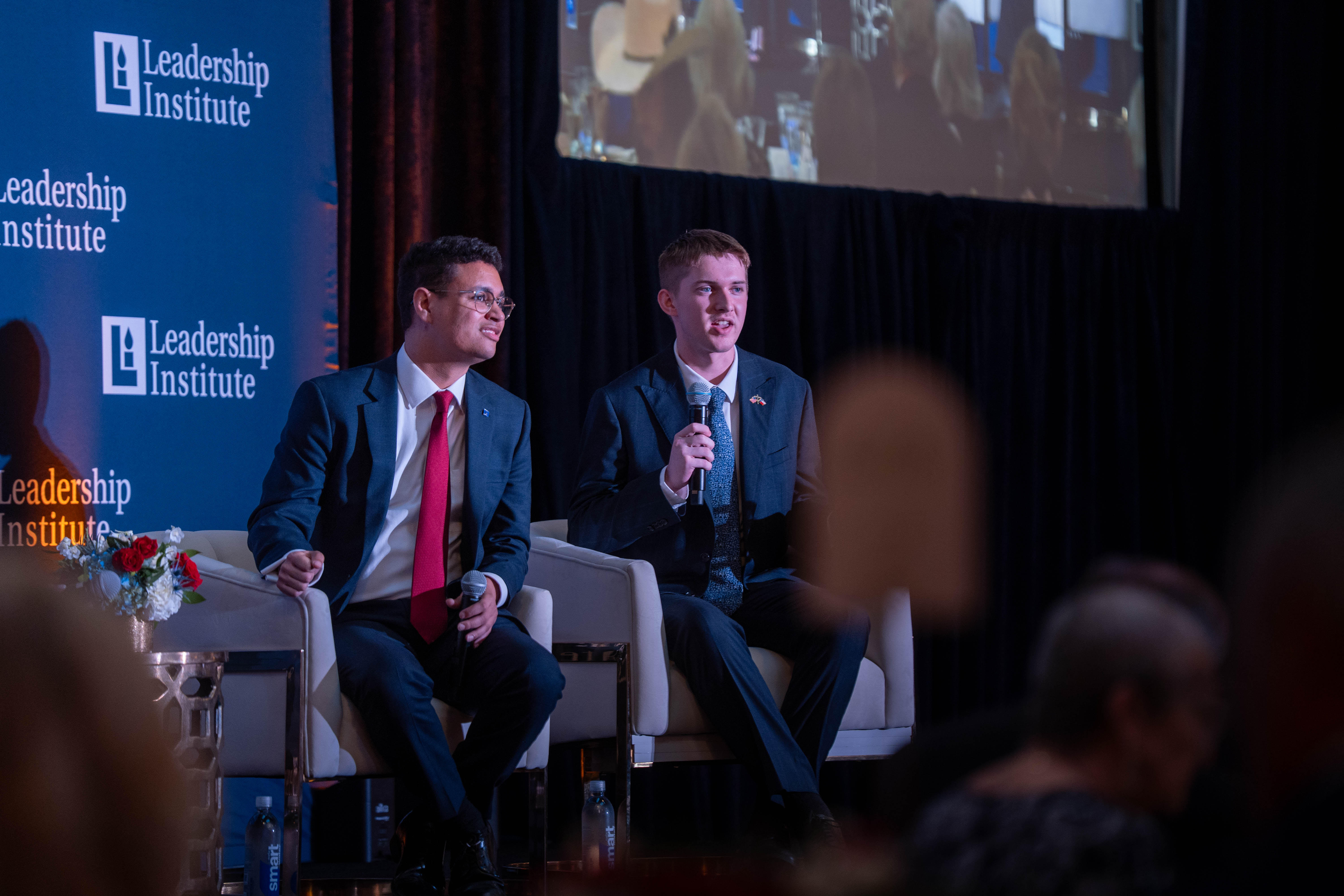 NHSC speakers on stage at a leadership event