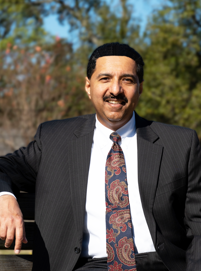 Executive headshot - man in suit outdoors