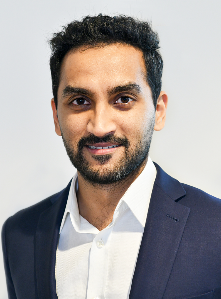 Executive headshot - man in navy blazer