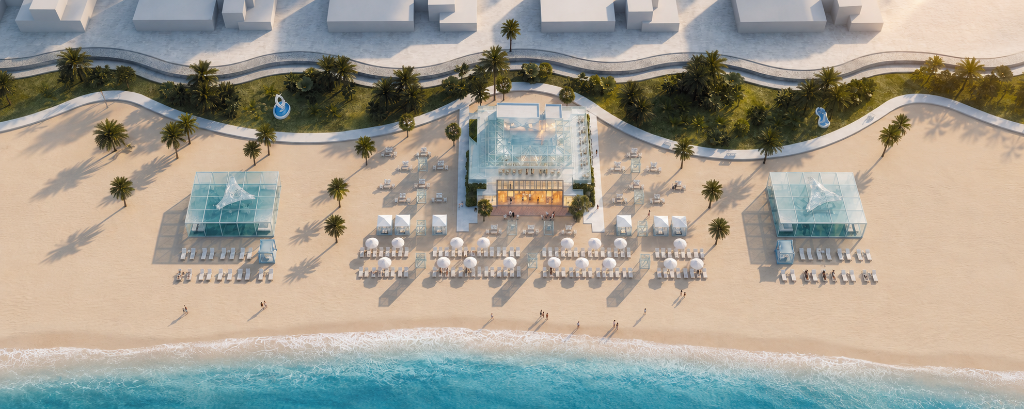 ICE BEACH by Major — illuminated beachfront tower at dusk over Marjan Beach, Al Marjan Island ICE BEACH by Major — illuminated beachfront tower at dusk over Marjan Beach, Al Marjan Island
