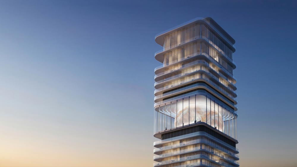 Inaura tower crown detail — triple-height sculptural void