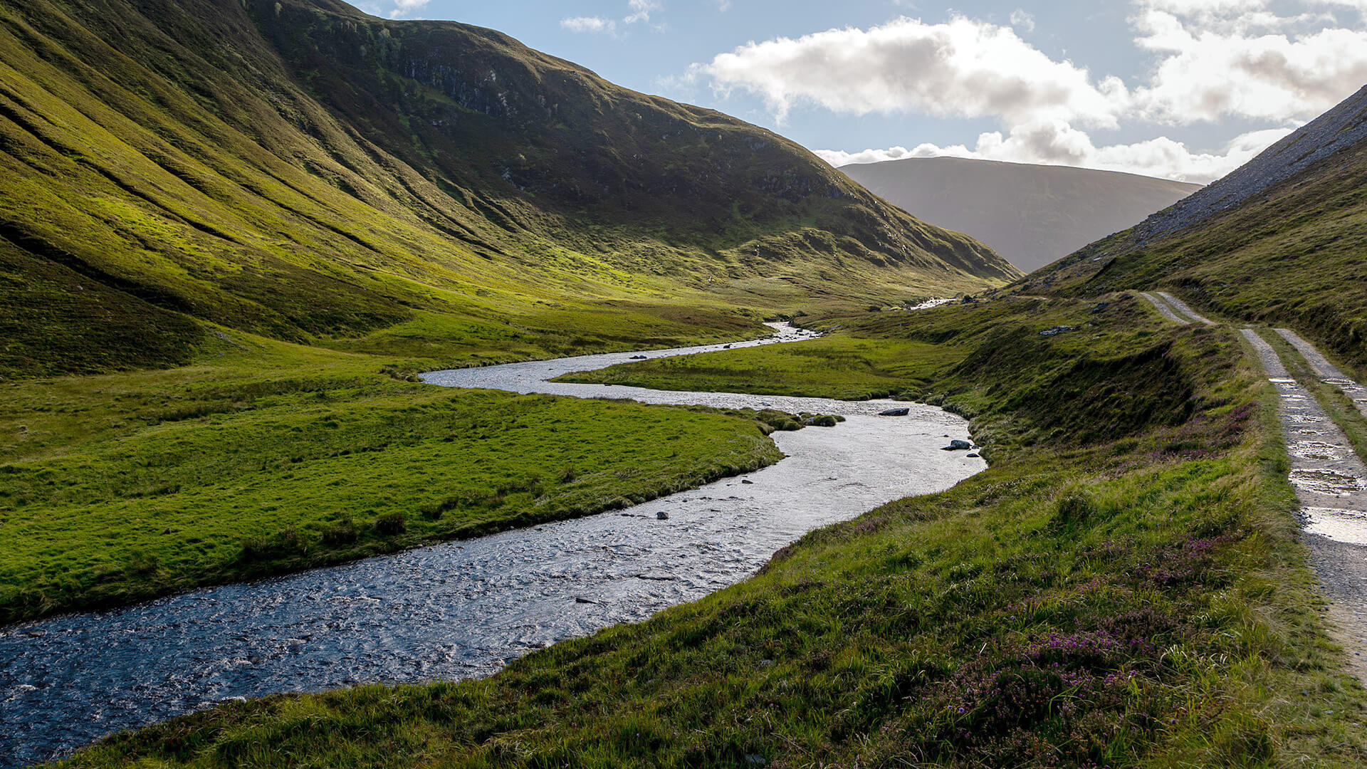 A river winding through Glen Mhòr at Alladale Wilderness Reserve, Scottish Highlands