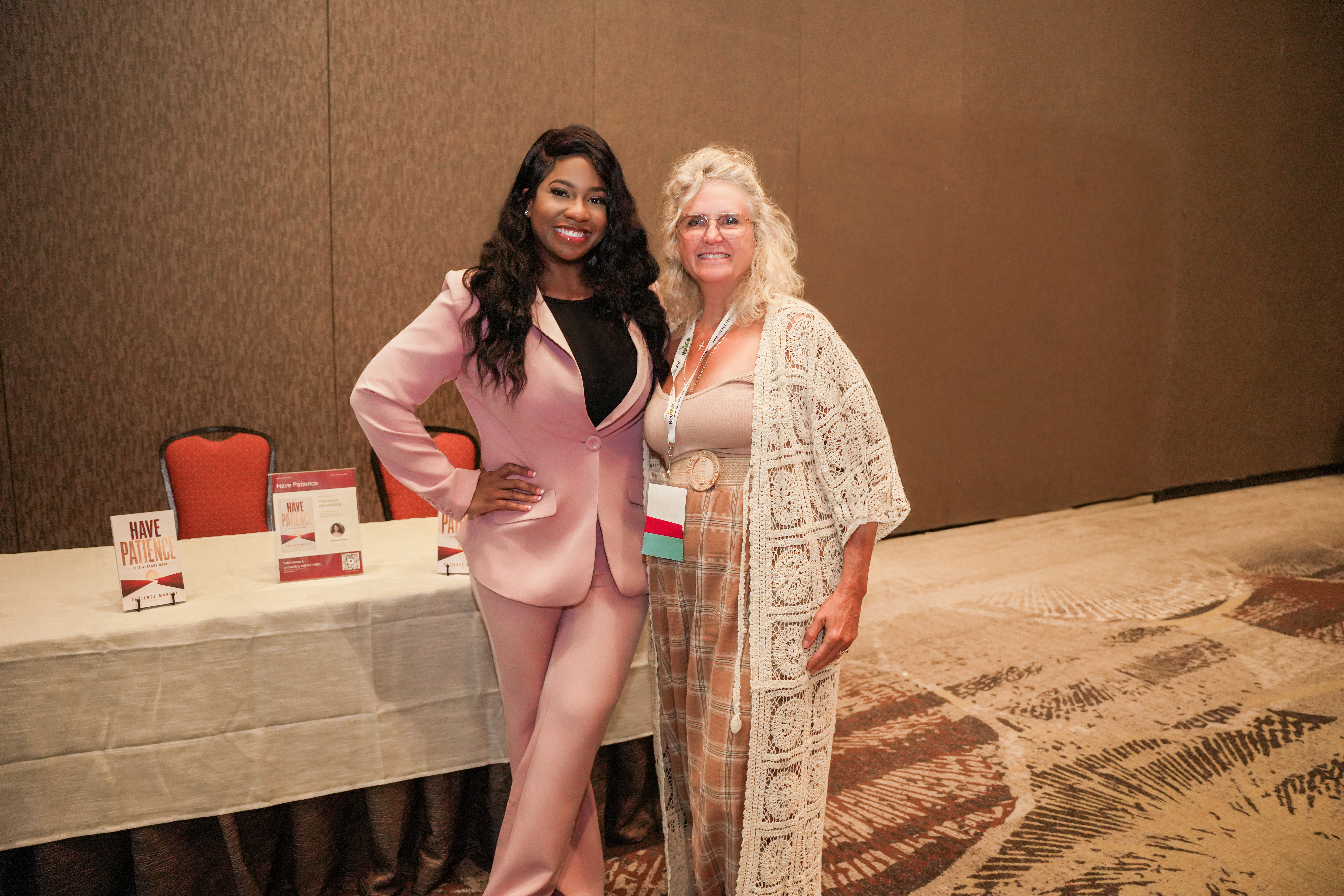 Patience at her book signing table