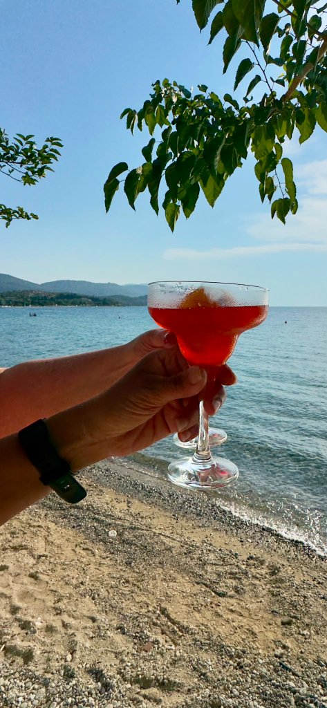 Red drink by the beach