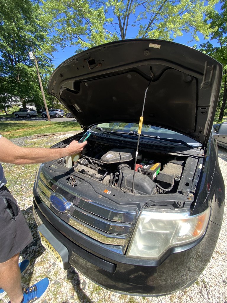 Scanning AnchQR tag on a car