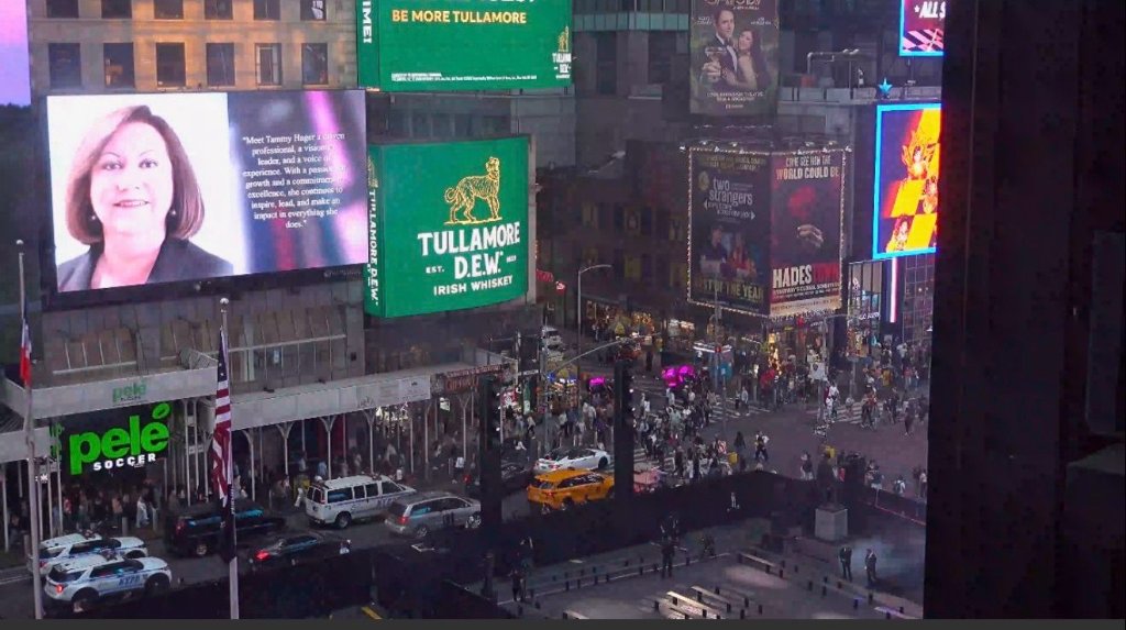 Tammy D. Hager featured on the Times Square billboard — May 19, 2026