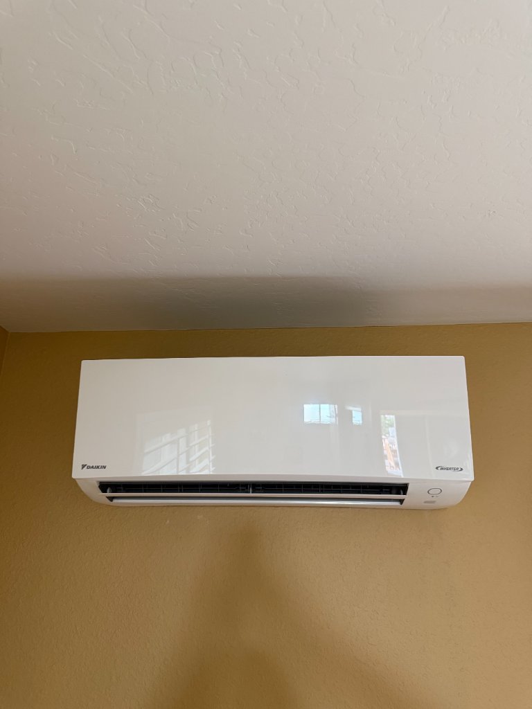Mitsubishi Electric wall-mounted outdoor condenser installation