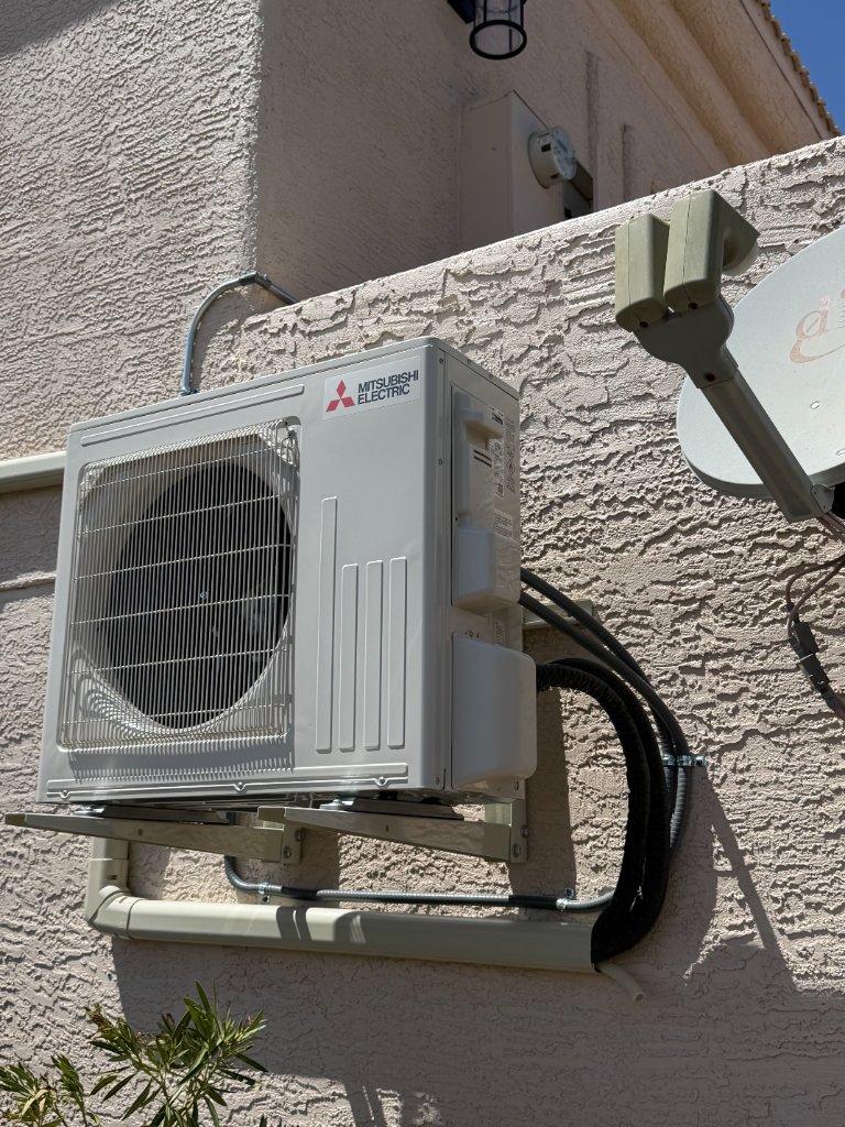 Wall-mounted Daikin mini split unit professionally installed