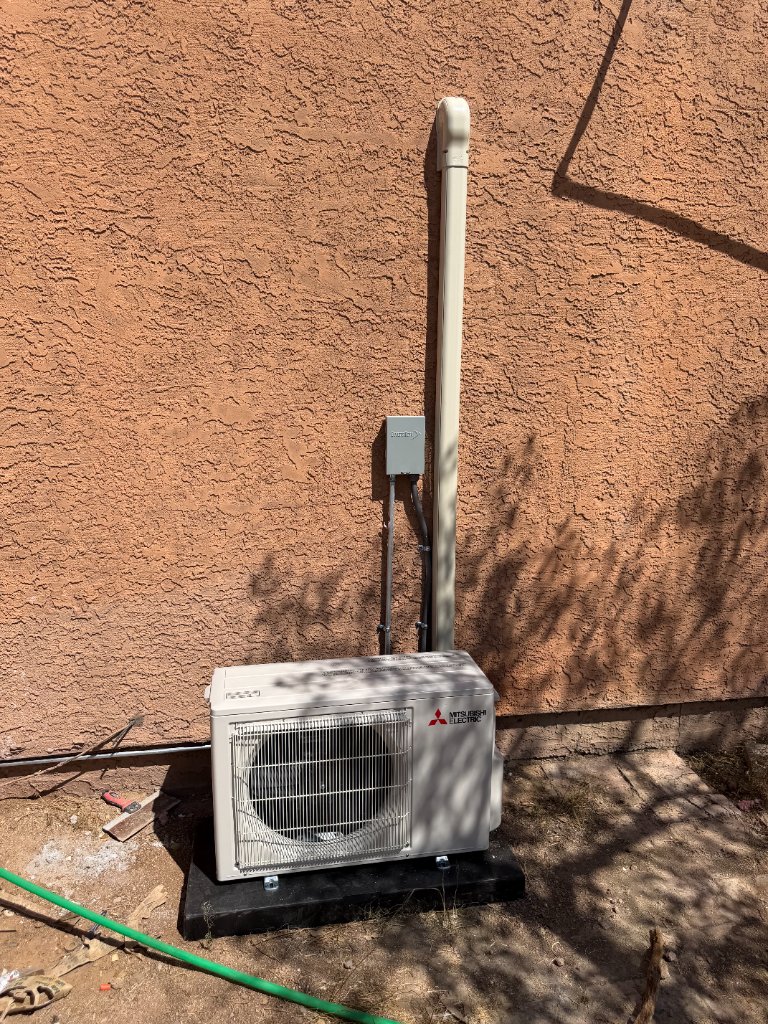 Mitsubishi mini split condenser and electrical hookup installation