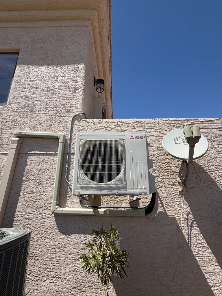 Daikin mini split indoor unit on wood accent wall installation