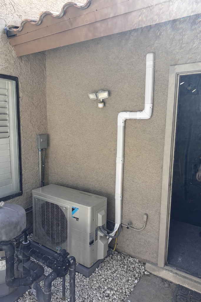 Completed outdoor mini-split installation and line routing