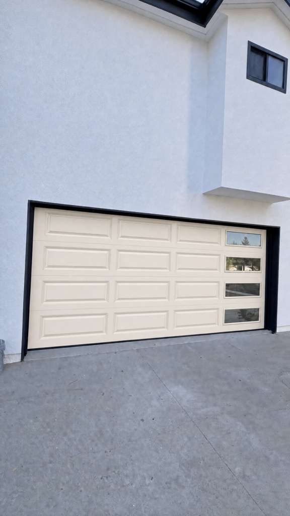 Old worn-out garage door opener mechanism with broken components requiring emergency replacement