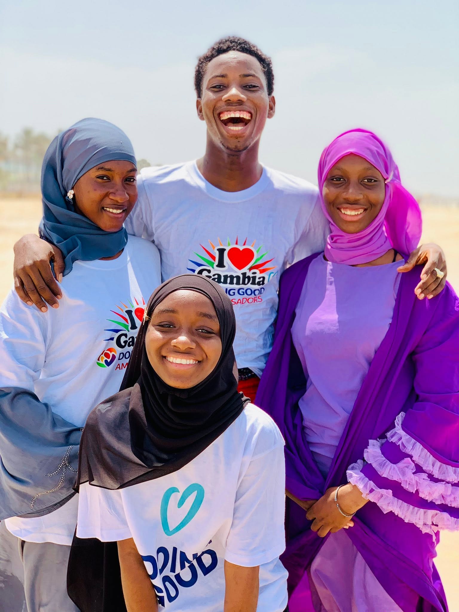 Happy ambassadors in the sand