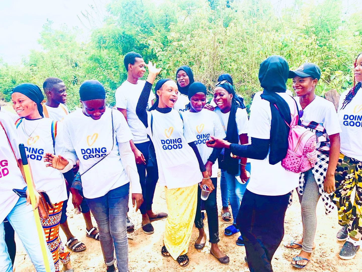 Group joy on the dirt road